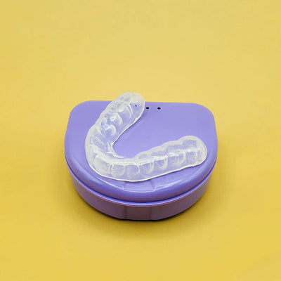 mouthguard sitting on a light purple case