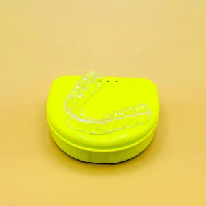 mouthguard sitting on a yellow case